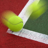 tennis ball hitting baseline corner